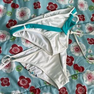 TWO white bikini bottoms size M, Quicksilver Raisins & Op